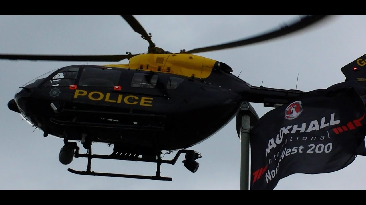 Police Helicopter landing for Simon Andrews @ Metropole Corner - North West 200 17th May 2014