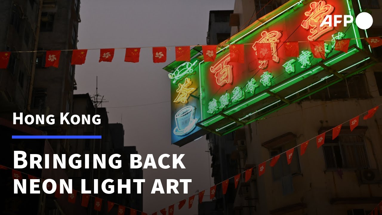 Hong Kong's young 'neon nomads' keep dying trade flickering | AFP