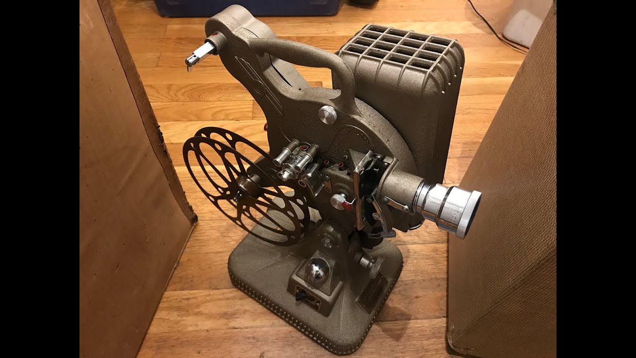 Keystone 16mm film projector, three films, and 16 mm camera