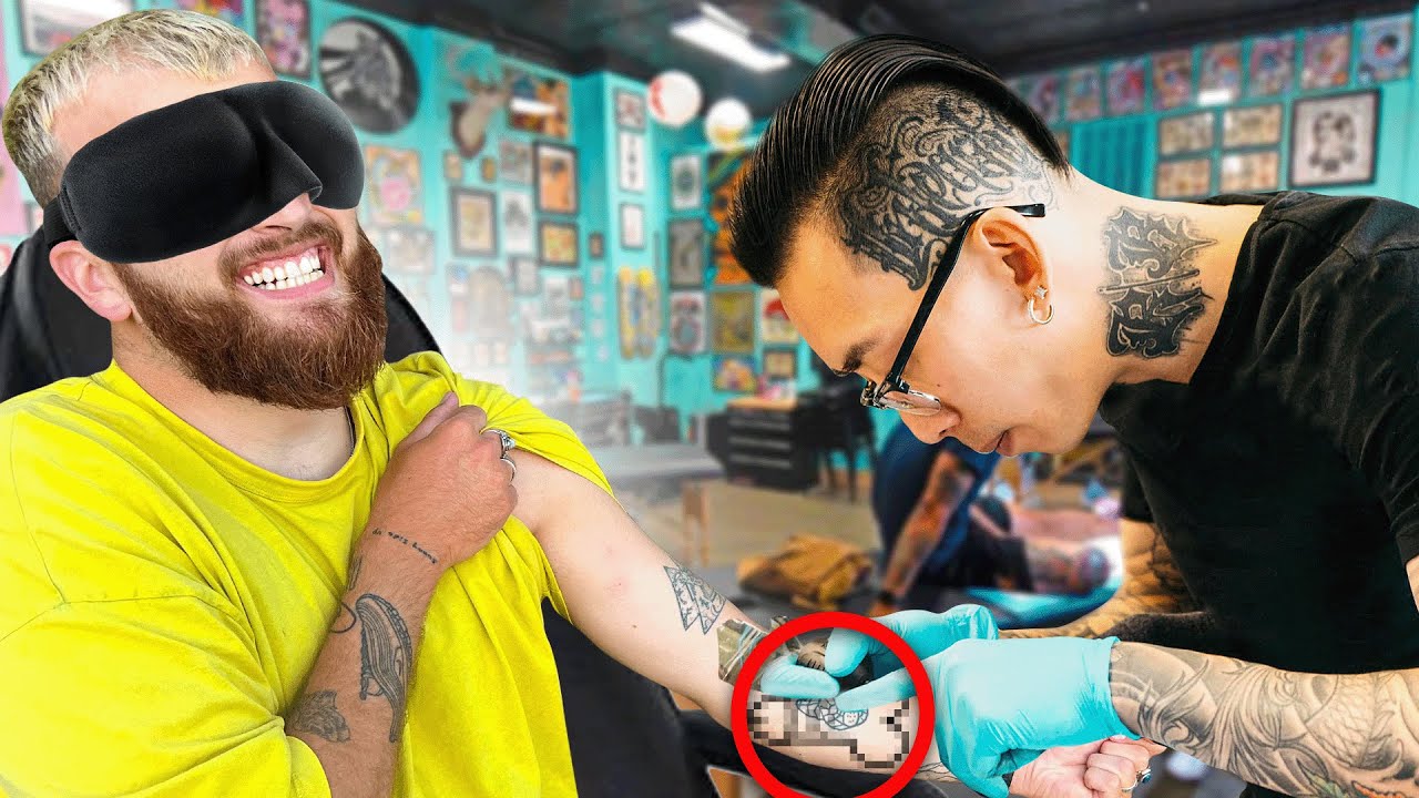 I'm BLINDFOLDING a TATTOO that my VIEWERS came up with!
