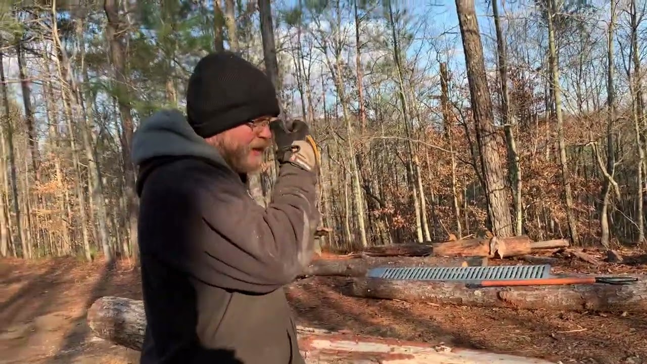 Removing bark from logs with a Draw Knife