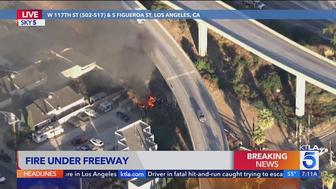 Another fire burns underneath another Los Angeles freeway