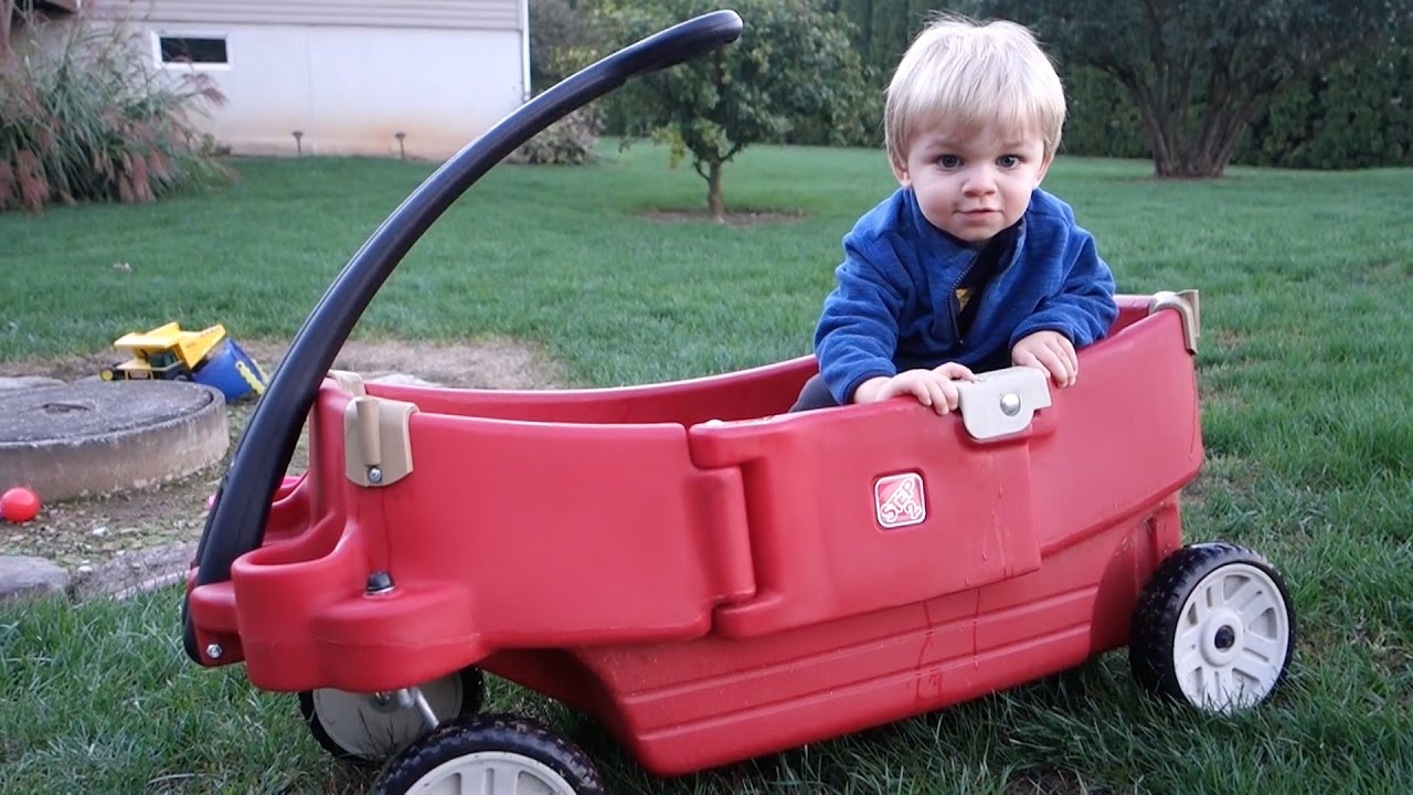 Taking Clark for a Backyard Wagon Ride