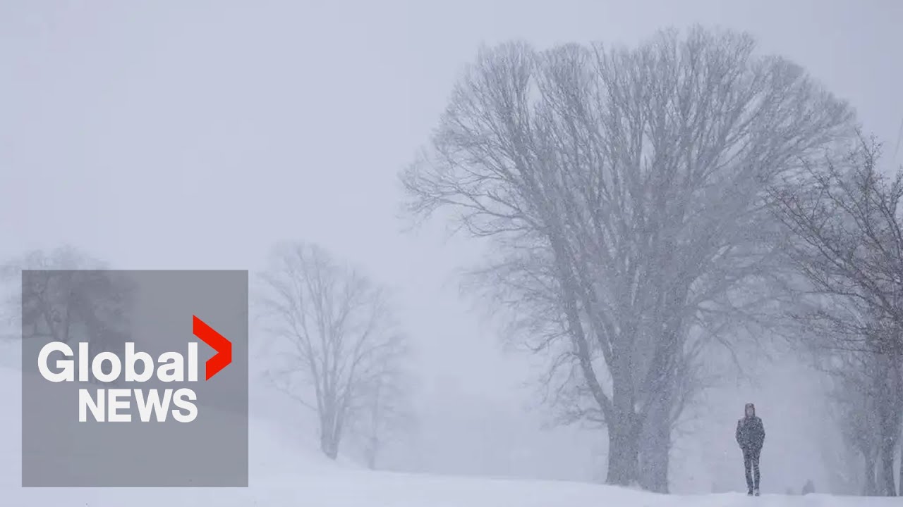 Snowstorms smother Eastern Canada, cause power outages