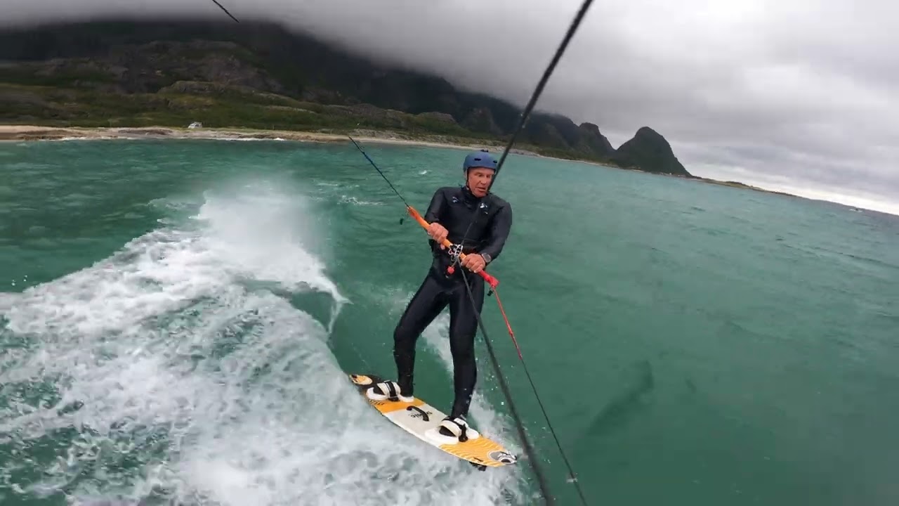 Kitesurfing at the island Tomma, outside the coast of Helgeland. Norway
