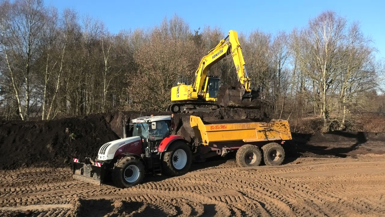 GROND VEEN LADEN MET EEN KOMATSU PC 240 NLC CASE PUMA 185 CVX STEYR 6225 CVX BE BO MA