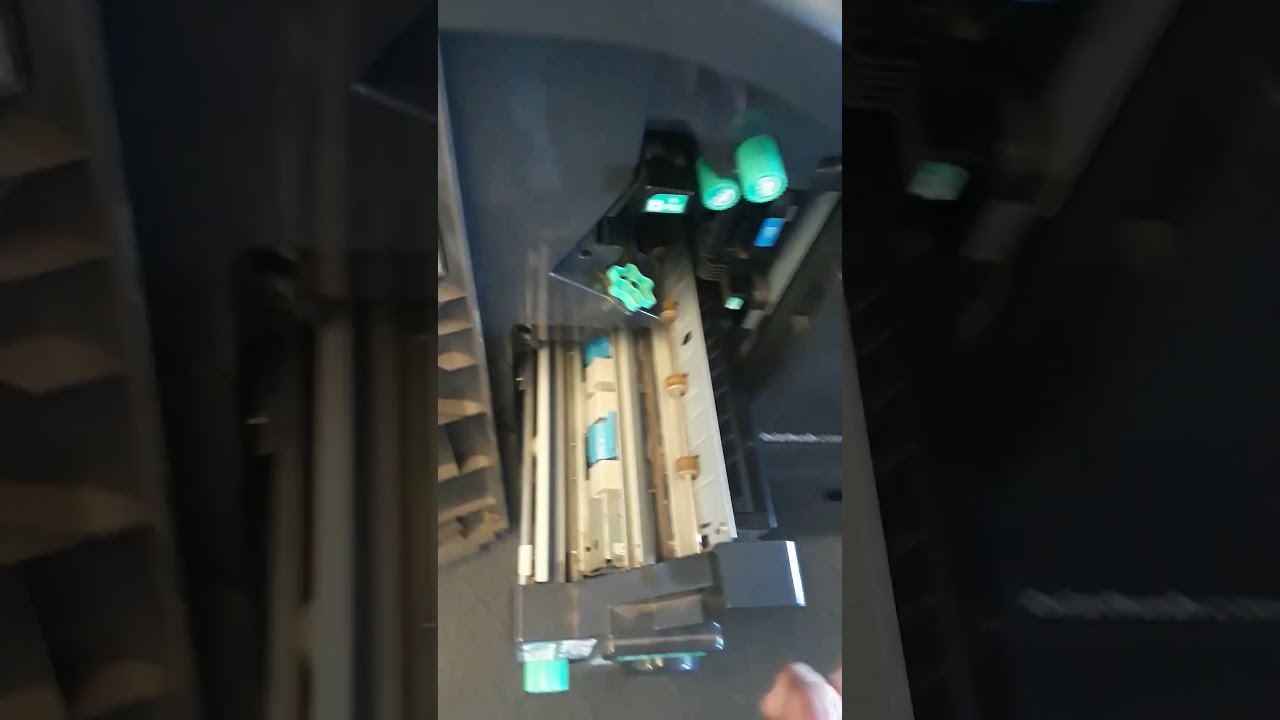 Konica Minolta FS 534 finishing unit folding paper at 45 degree angle Fixed.