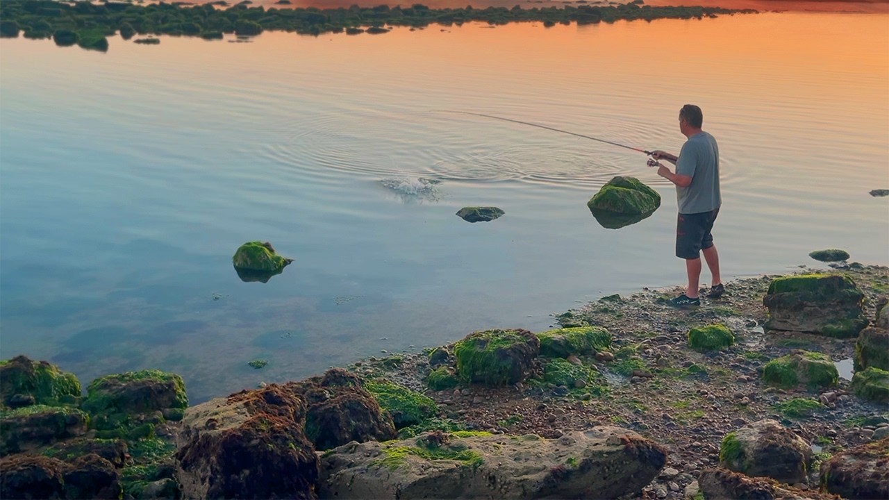 Lure Fishing for Bass in a Saltwater Lagoon