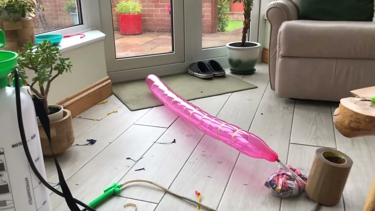 squealley rocket balloons go BANG