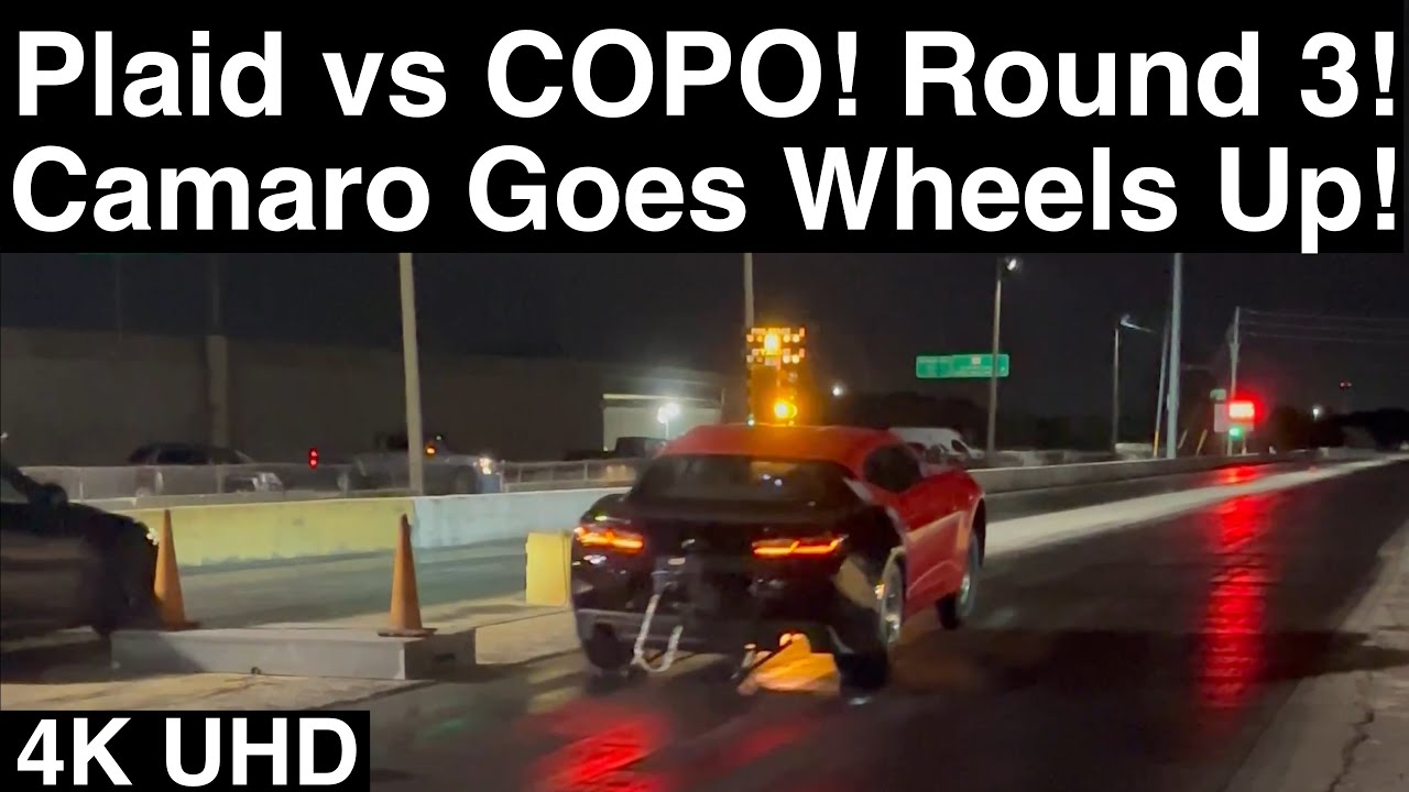 COPO Camaro WHEELS UP vs Tesla Plaid! COPO’s BEST RUN YET! Drag Racing Action in 4K UHD!