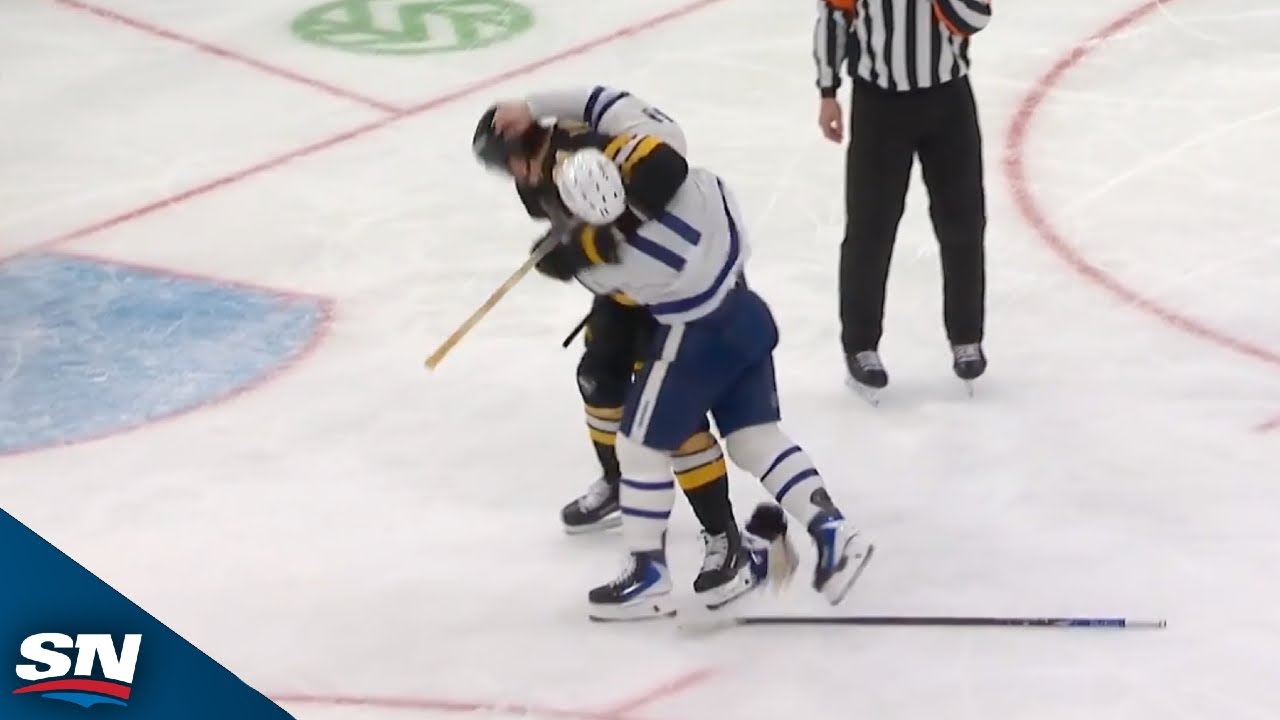 Mayhem breaks out as Max Domi drops gloves with Nikita Zadorov in front of Bruins' goal