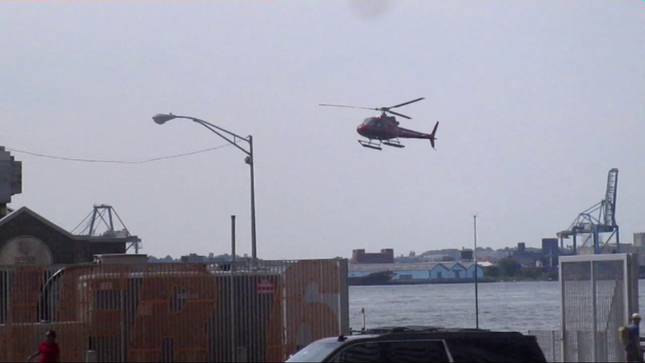HELICOPTERS  AND BOATS AT PIER16  NYC MANHATTAN  ( DOWNTOWN MANHATTAN)