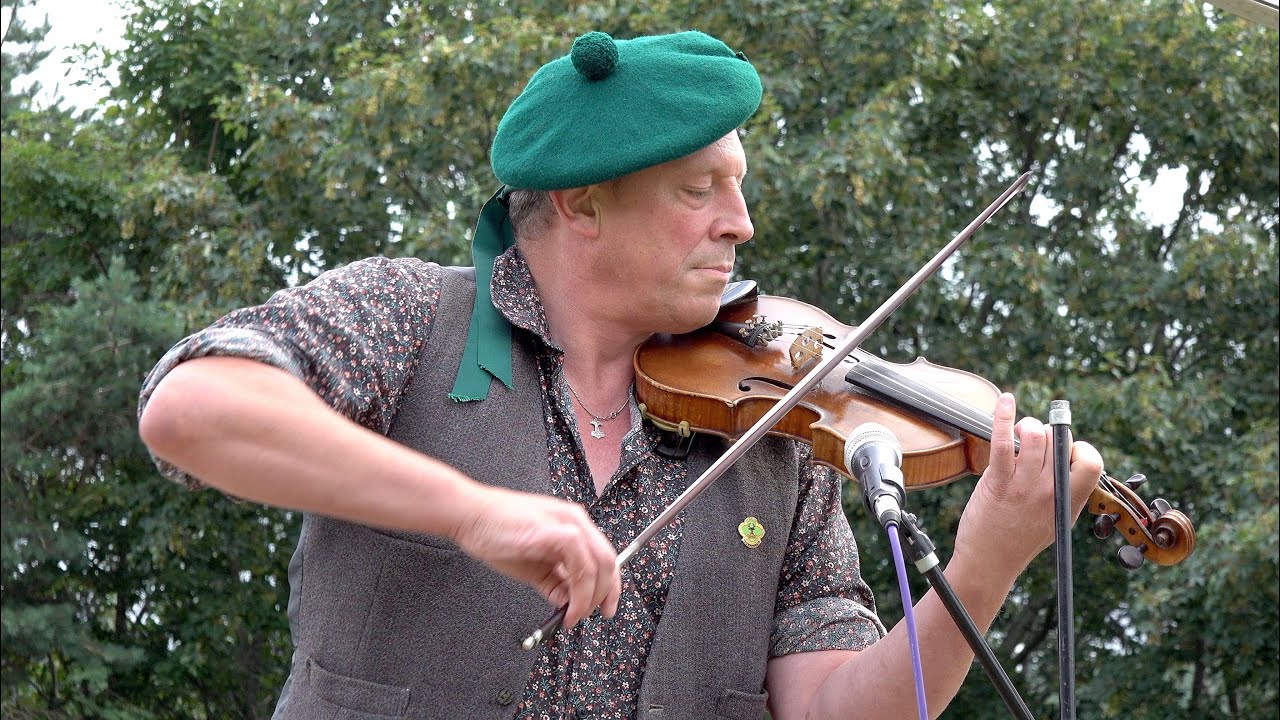 Scottish fiddle player Paul Anderson performing traditional local reels for Ballater Games day 2021