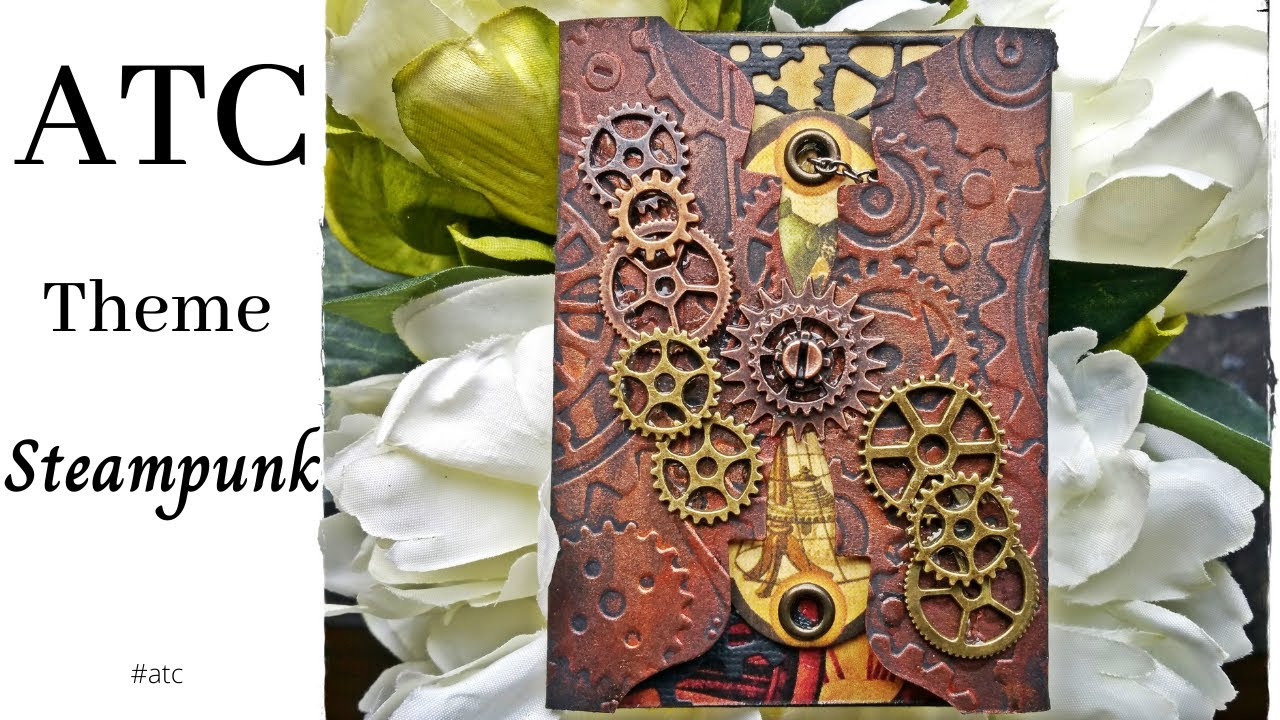 ATC theme Steampunk - Mixed Media style with lots of metal gears and chain that opens to a secret