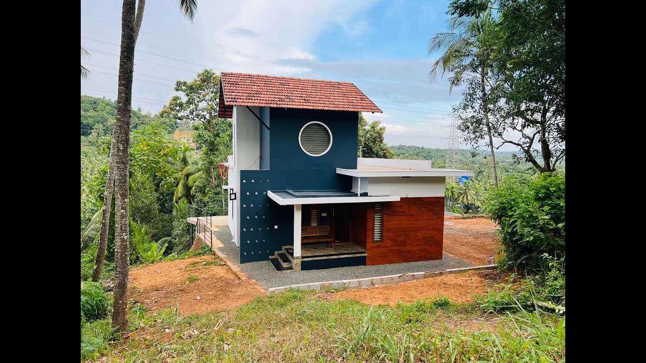 4.5  cent ൽ  14.5 ലക്ഷം കൊണ്ട്  1200 sqft ലെ ഒരു  വീട് .