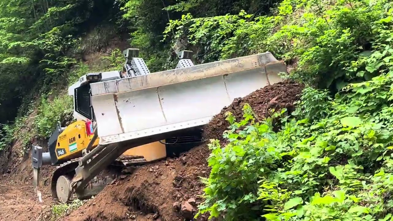Orman yolunda büyük onarım nasıl olur izleyin.