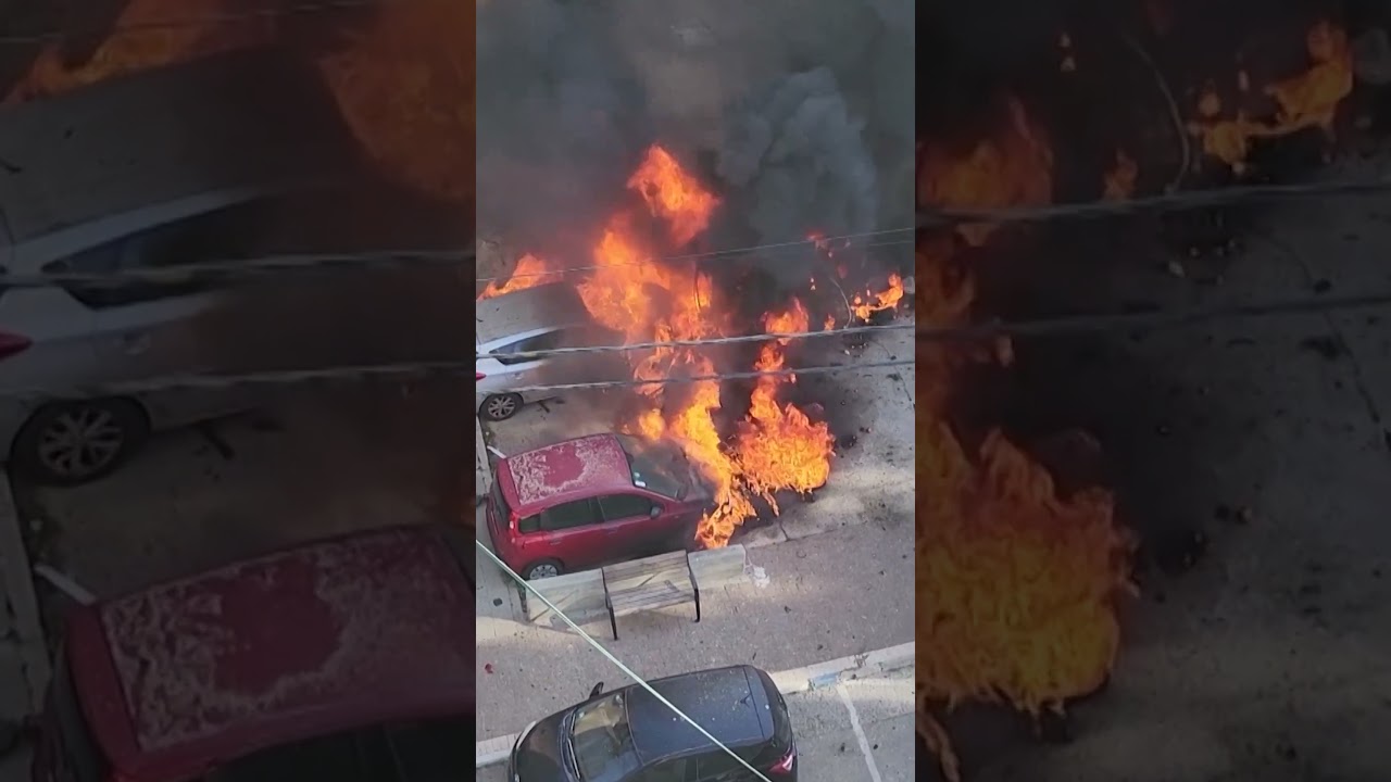 Shrapnel from Iranian missile attack sets vehicles ablaze in Israel