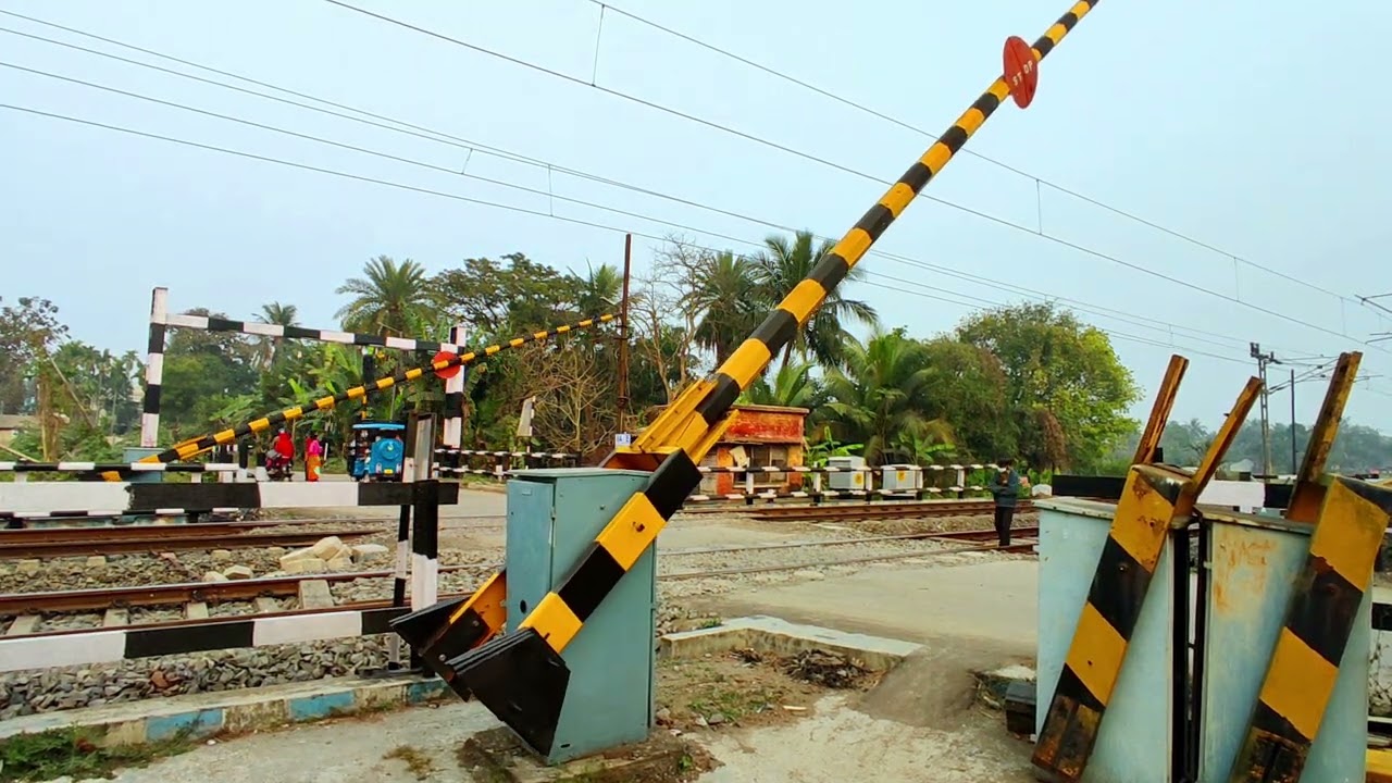 Perfect Train Crossing Different Generation EMU Local Train Blasting Through Rail Gate