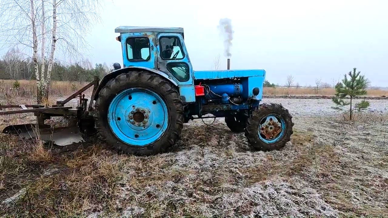 Купил Т-40АМ. Запуск, троит, пробую пахать зимой.