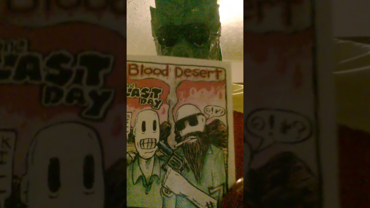 ganjaman looking at Adam Yeater's comix