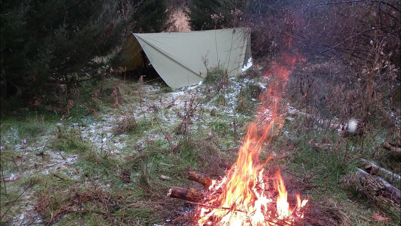 Winter tarp camping flurries sleet rain wind a little snow with minimal beer