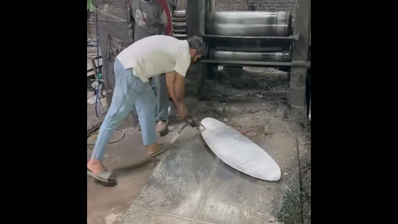 Making a giant cooking pot 