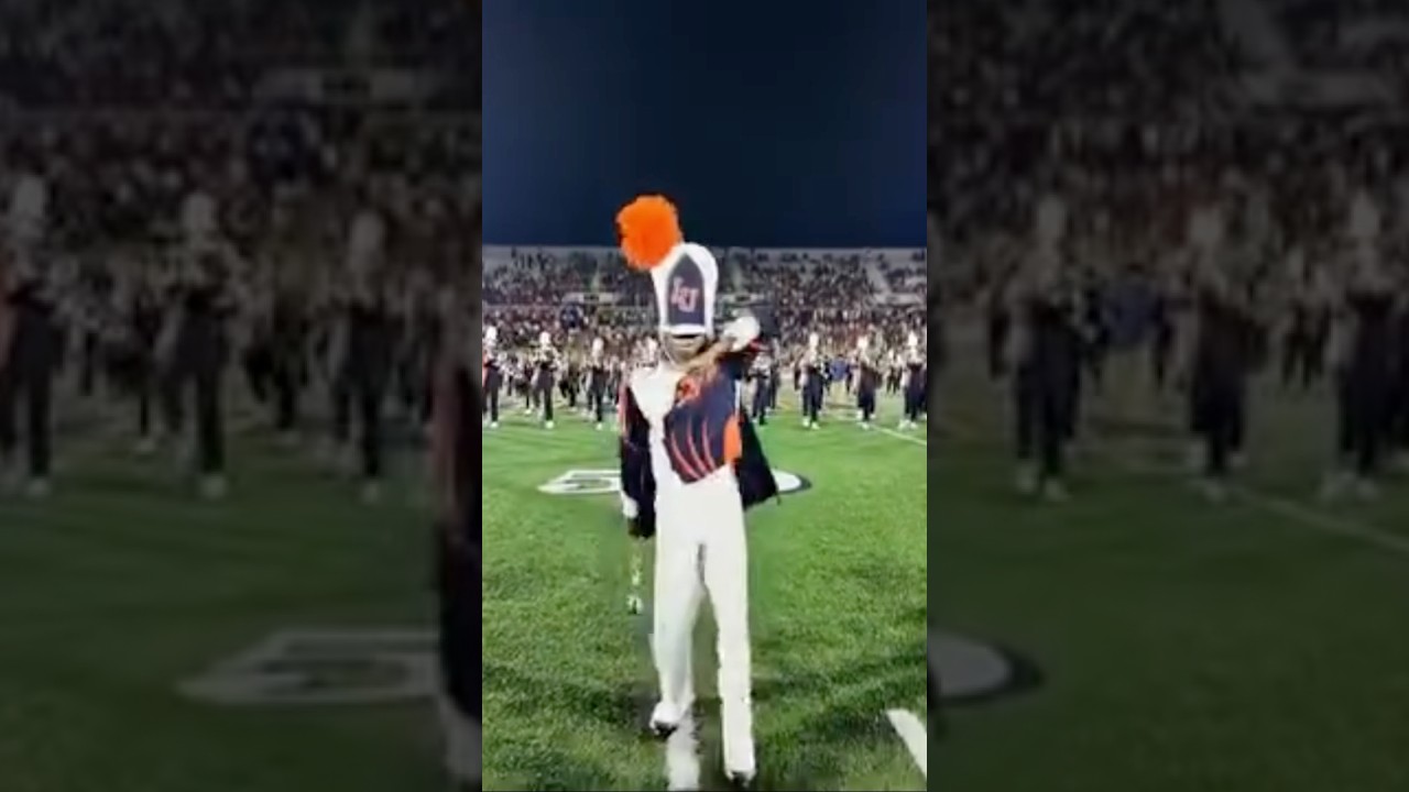 Langston University Marching Pride Drum Major 🧡💙🦁💂🏾&zwj;♀️
