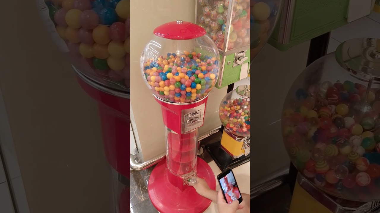Look at this large gumball candy machine dispenser with cute once 