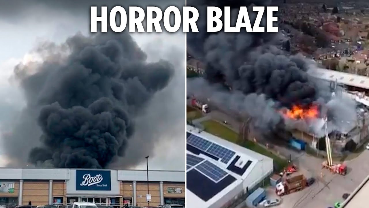 Massive fire engulfs shopping centre as smoke forces residents indoors