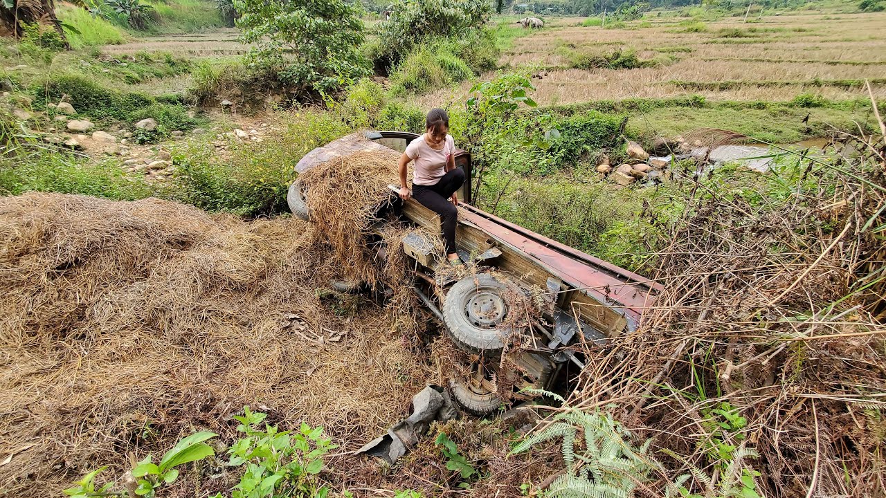 The overturned truck was badly damaged and the mechanic will tow it back for repairs