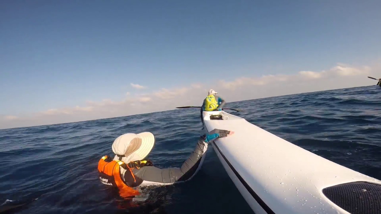 Re-entry into double surf ski.