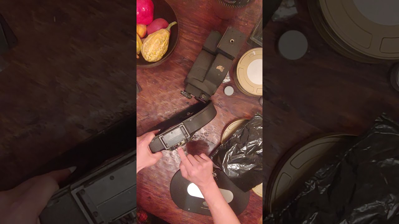 Loading Arriflex 35-3/2C 400ft. Magazine