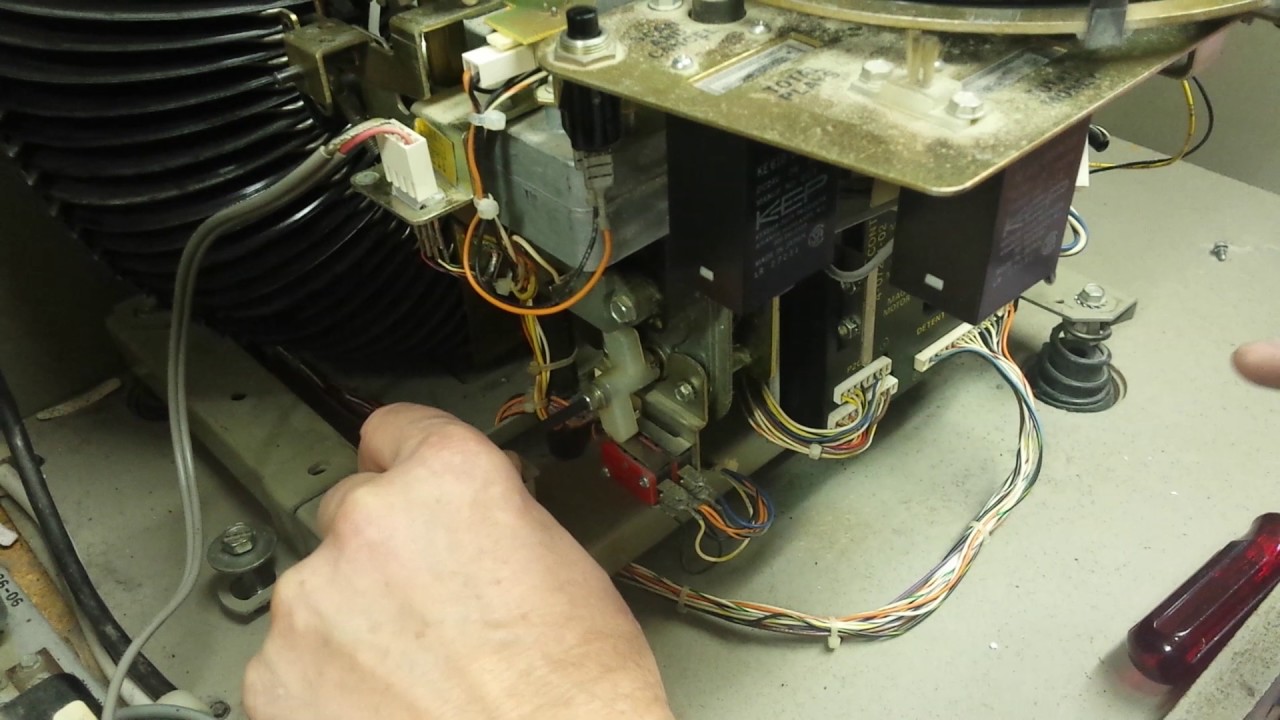 adjusting a tone arm assembly