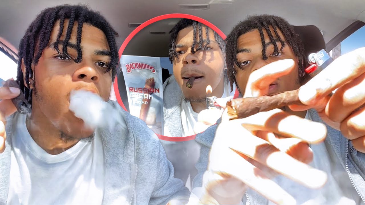 FIRST TIME TRYING | ROLLING A BACKWOOD 😳 CAR HOTBOX