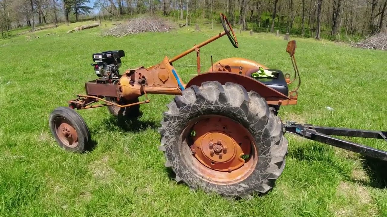 predator powered allis b moves hay with bale buggy