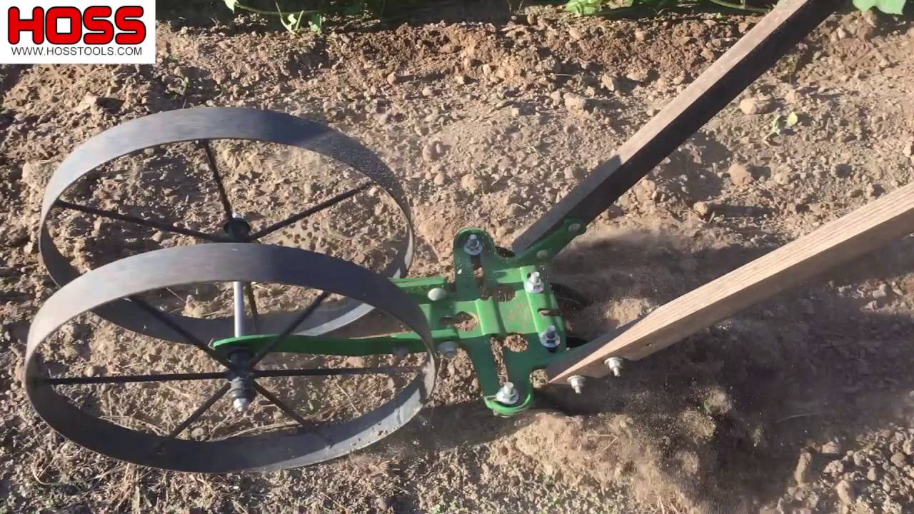 Garden Cultivating with the Hoss Double Wheel Hoe