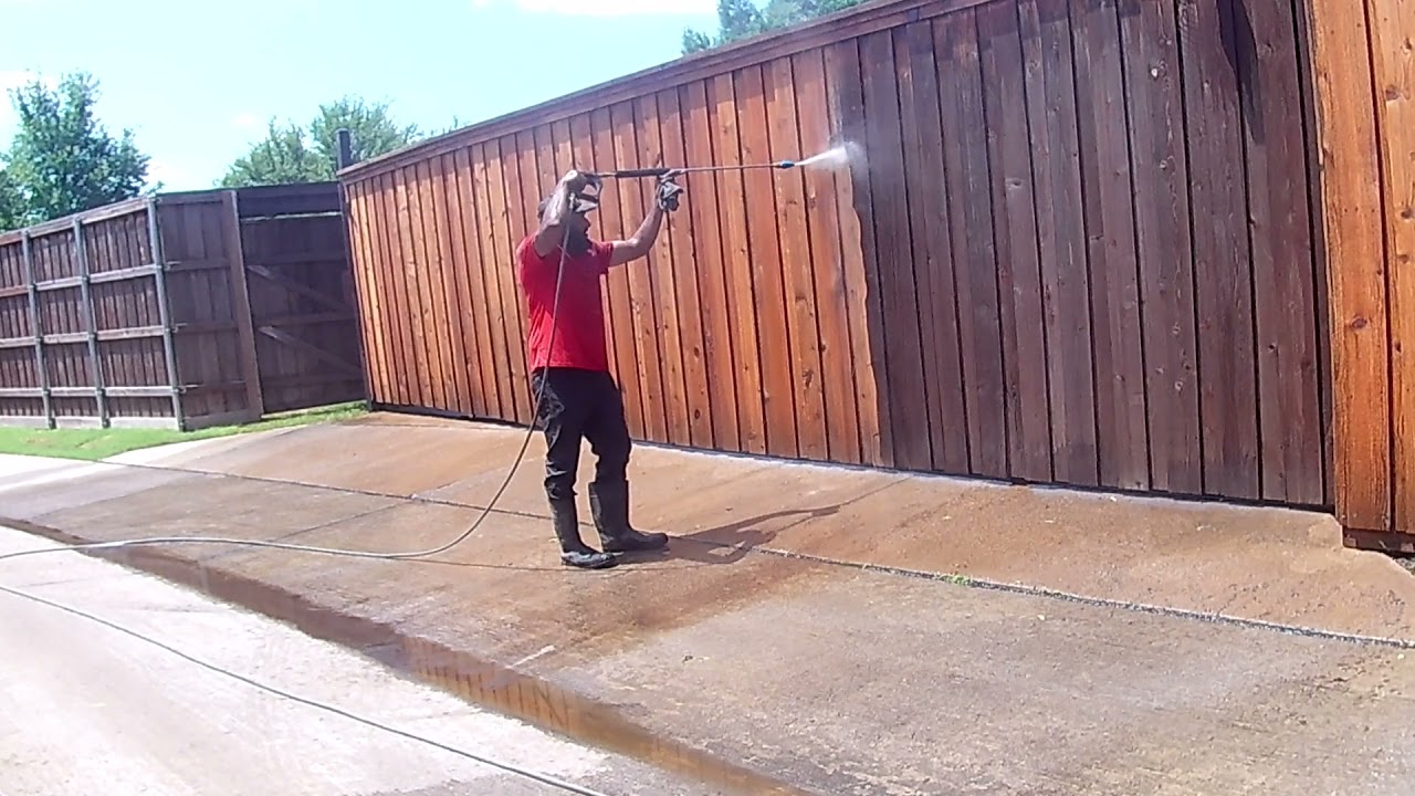 Pressure Washing a Large Cedar Fence In Richardson Texas