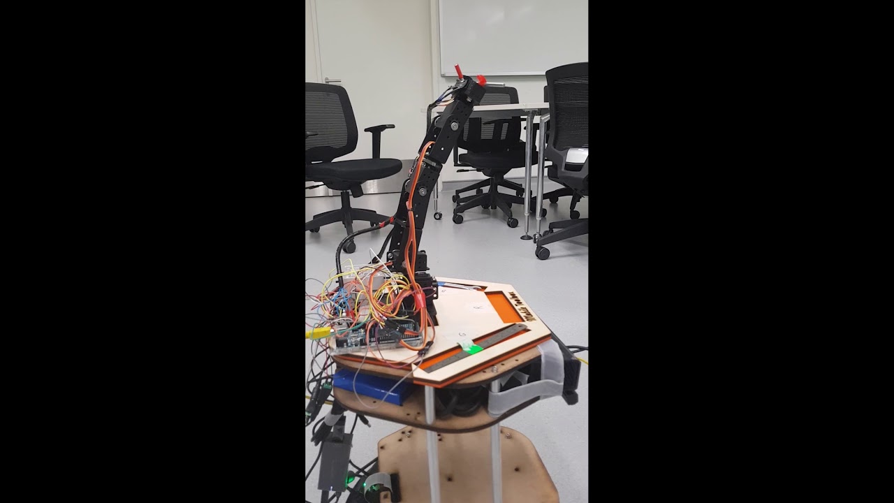 SUTD Mobile Toolbox Robotic Arm Grabbing Red Allen Key