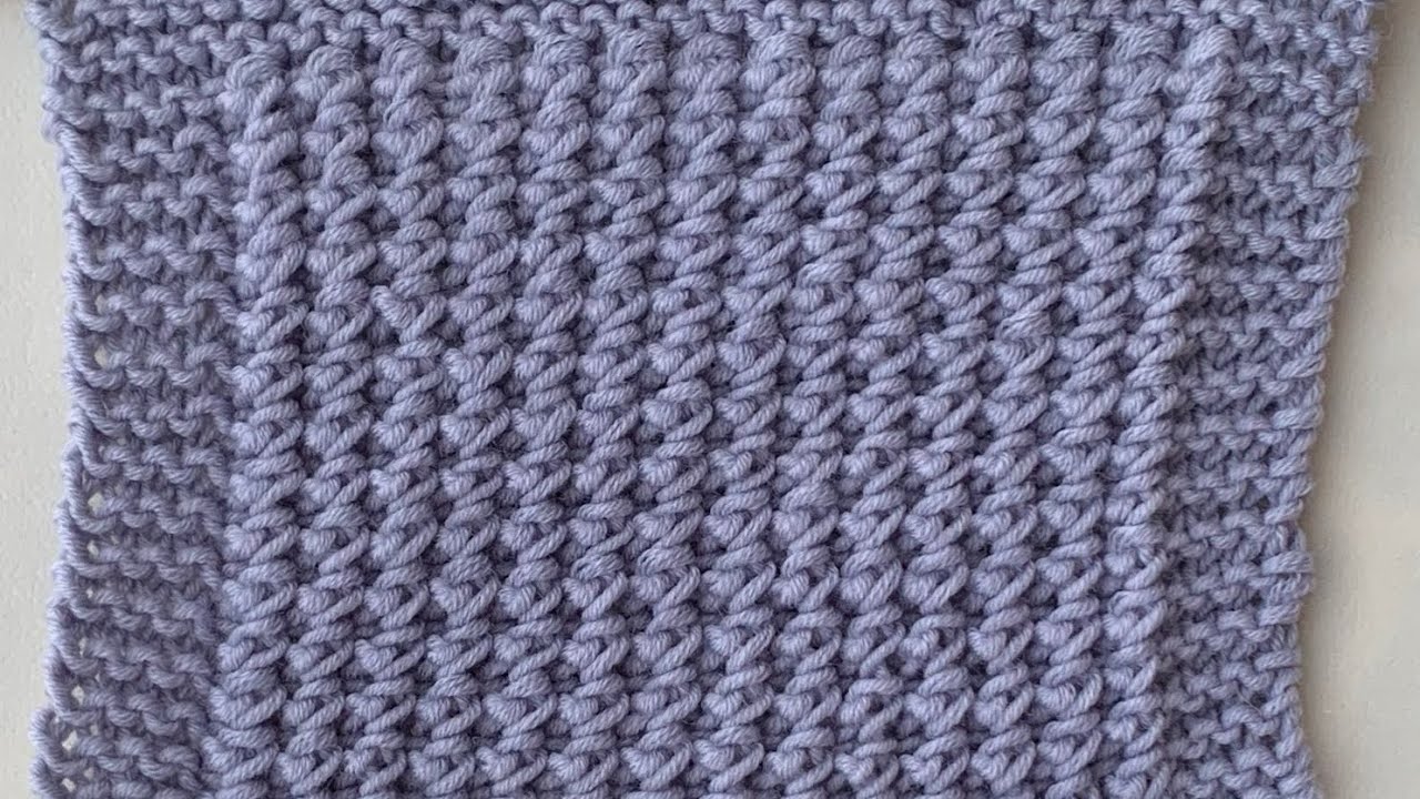 Modello  copertina neonato ai ferri. Punto adatto anche  a cappelli e cardigan.Tutorial semplice. 🌷