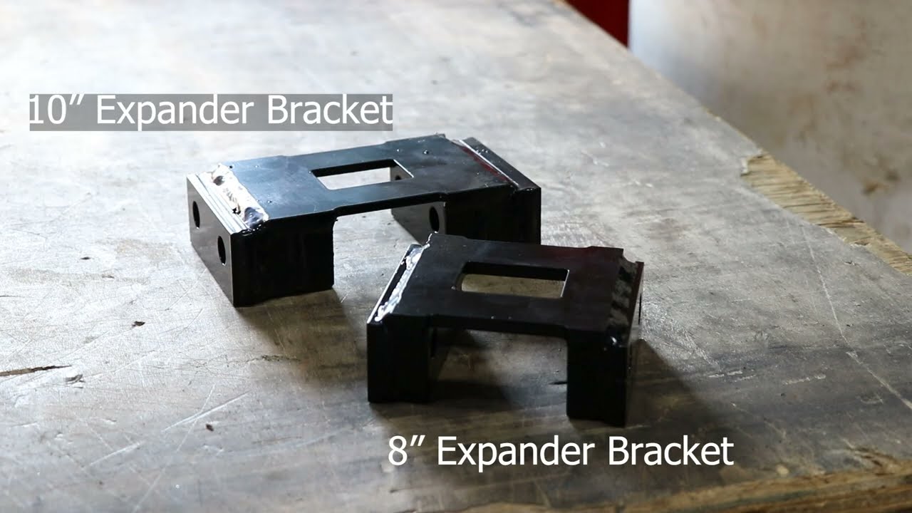 Adjusting Trencher Chain Width