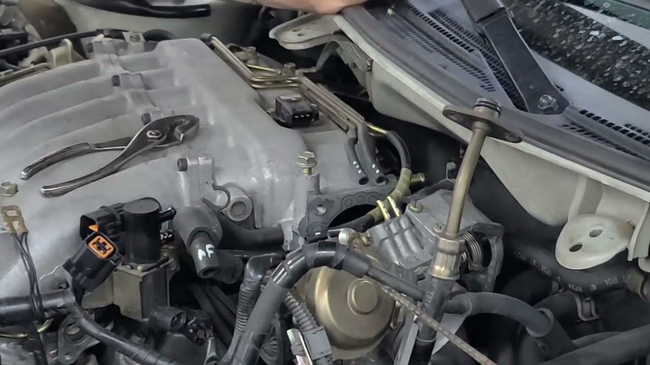 Valve Cover Gaskets, Spark Plugs and Plug Wires on a 2003 Mitsubishi Eclipse