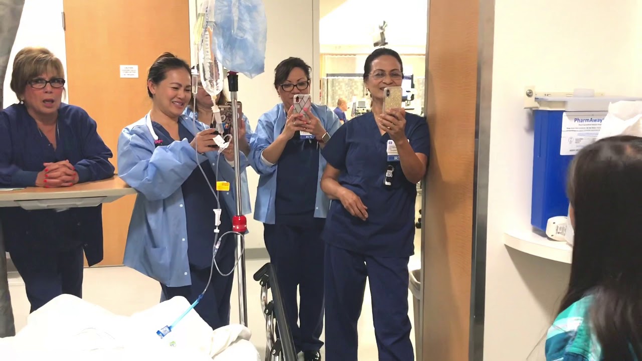 8 yr old Madison Baez singing to nurses at dads bedside City of Hope