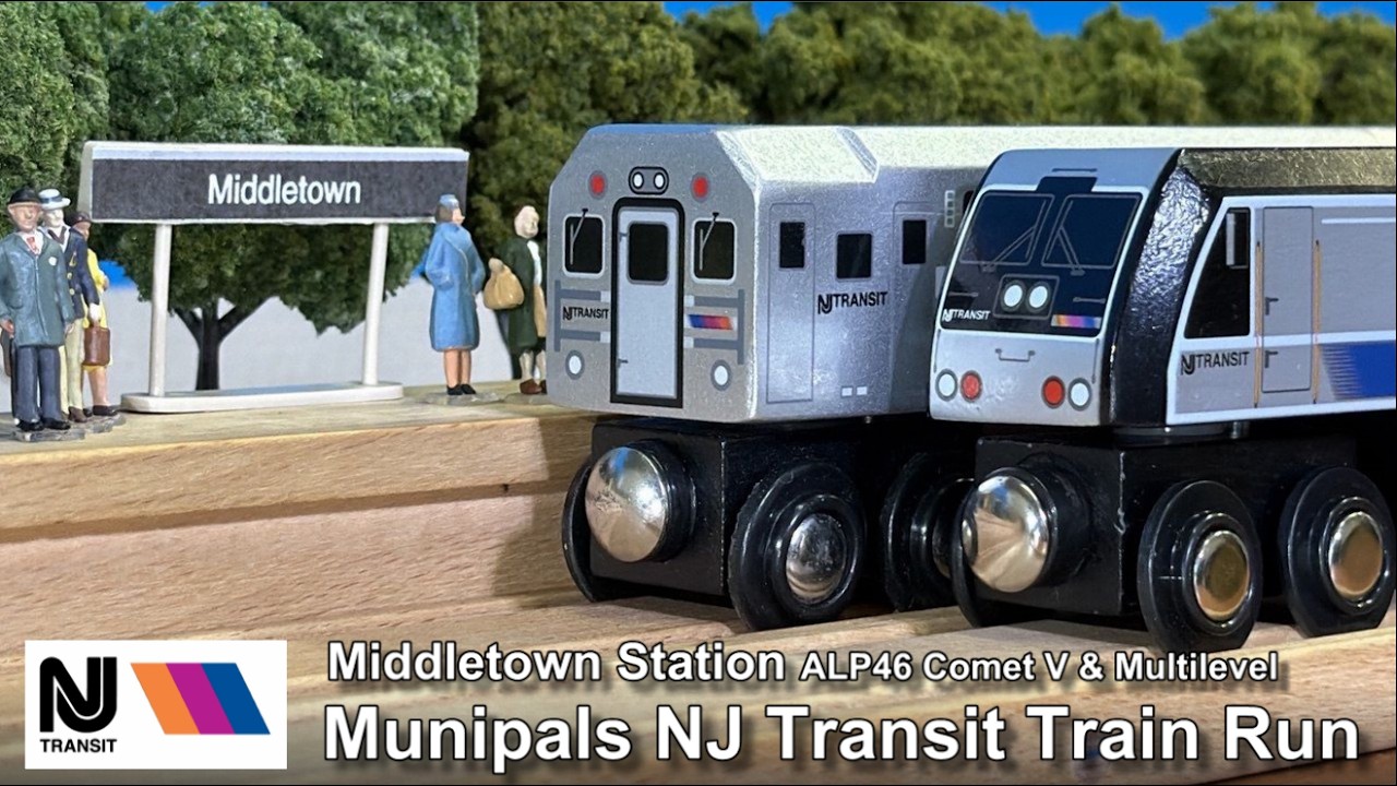 Поезд компании Municipal New Jersey Transit, курсирующий по городу Мидлтаун: локомотив ALP46, пое...