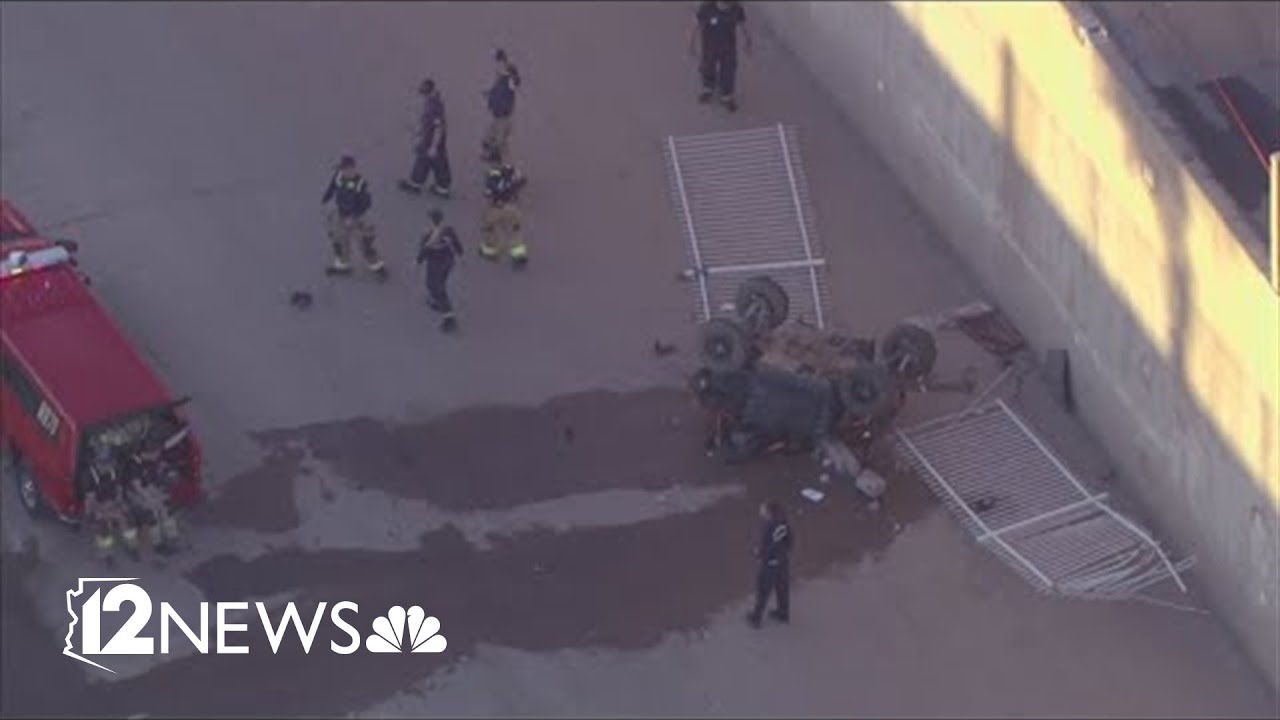 ATV crashes through gate, lands upside down in dry canal; 2 teens critically injured