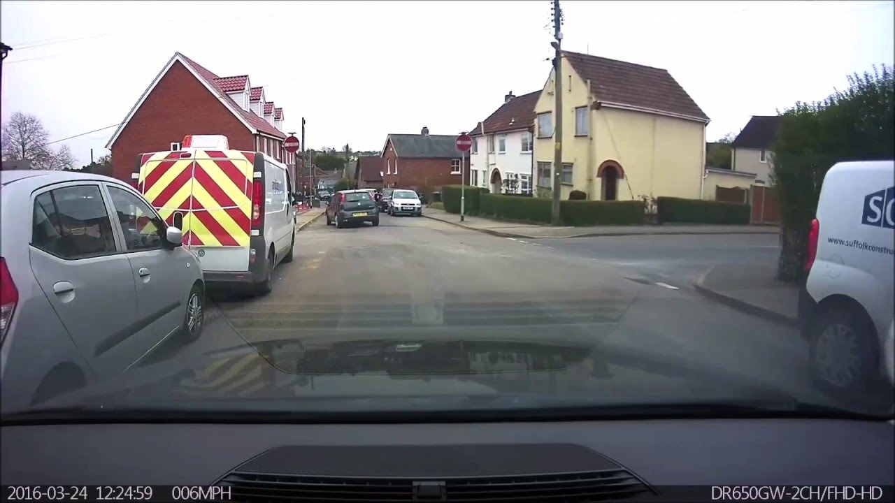 Three Cars Through A No Entry Sign