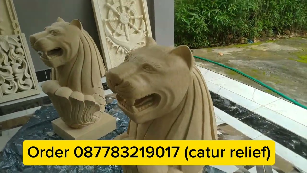Patung Air mancur model merlion terbuat dari pahatan batu paras jogja
