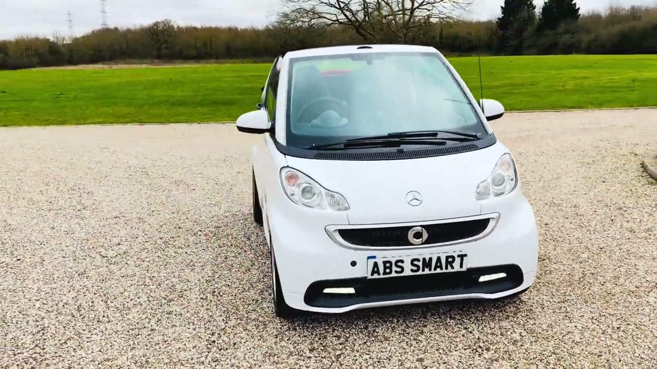 Our beautiful all white with the red roof convertible at only £4,000