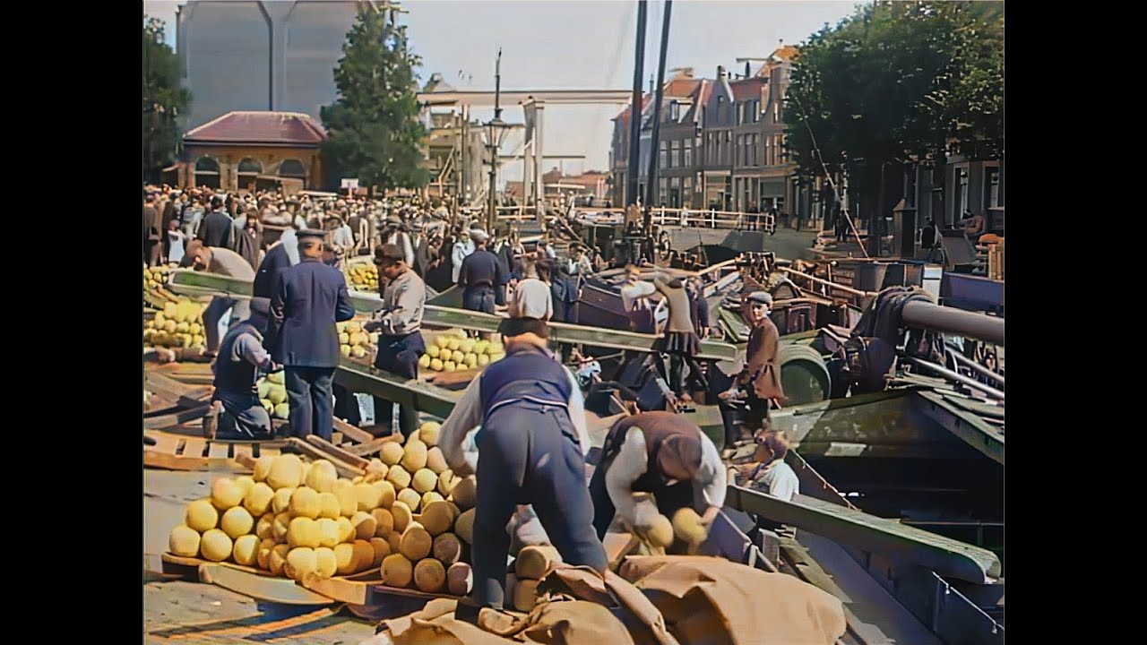 Beautiful Alkmaar (NL) and its Cheese Market over 100 years ago in 1922 (A.I. enhanced & colorized)