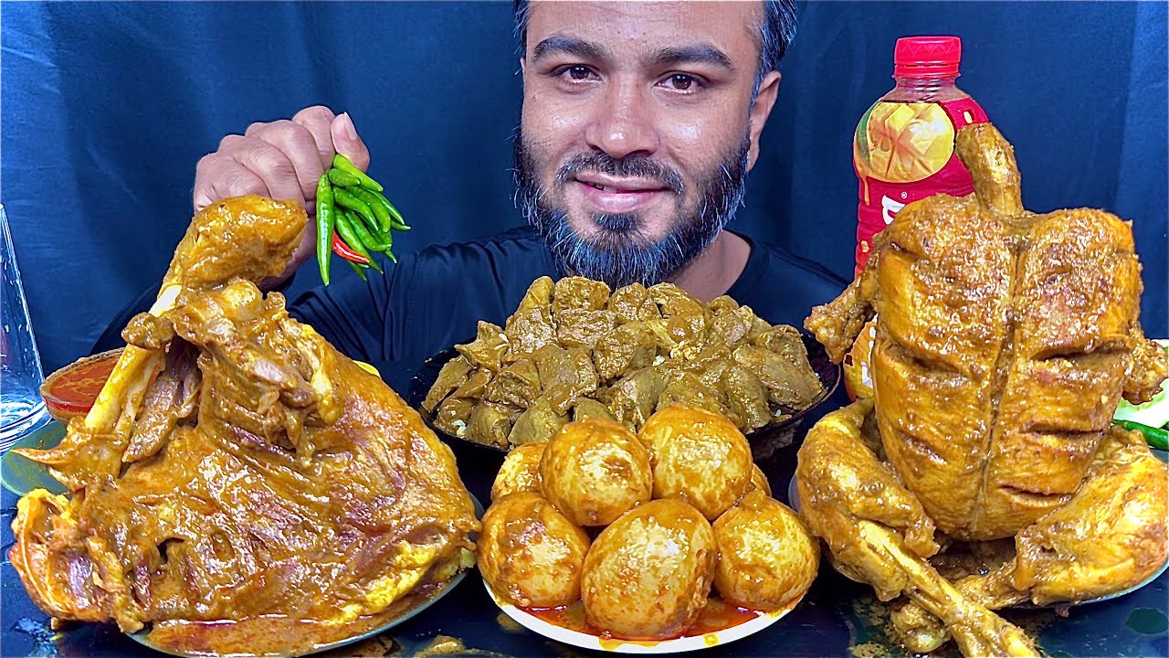 spicy full mutton leg piece curry mutton liver curry egg curry full chicken curry green chili eating