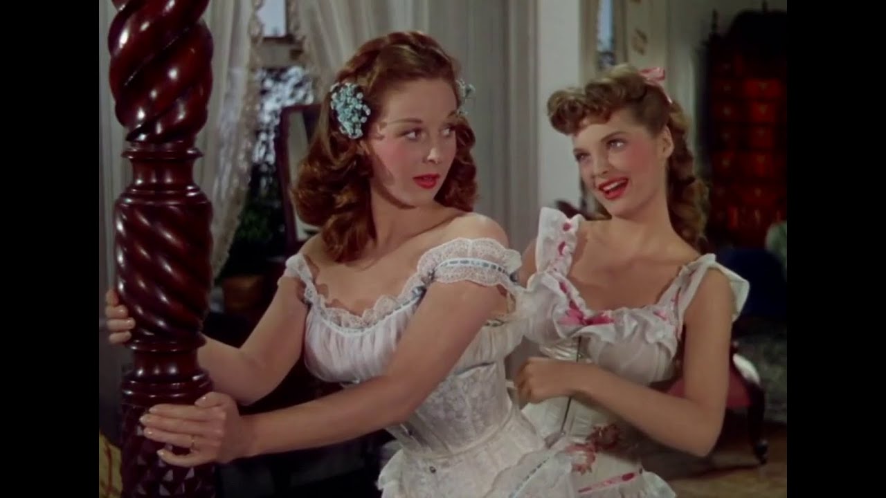 Susan Hayward gets laced into a corset by Julie London - Tap Roots (1948)